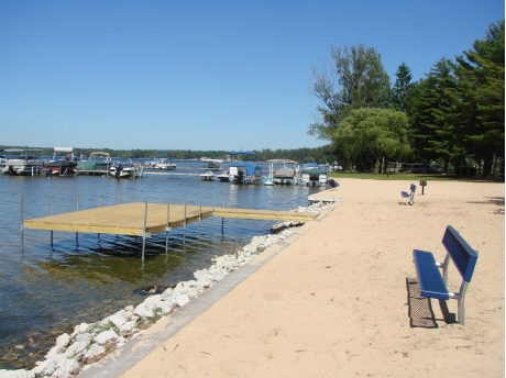 Sandy beach area and swim dock